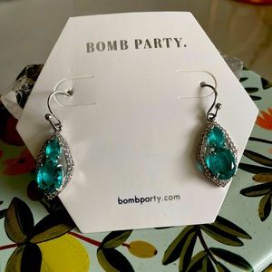 New with tags lab created aquamarine dangle Ring Bomb earrings.